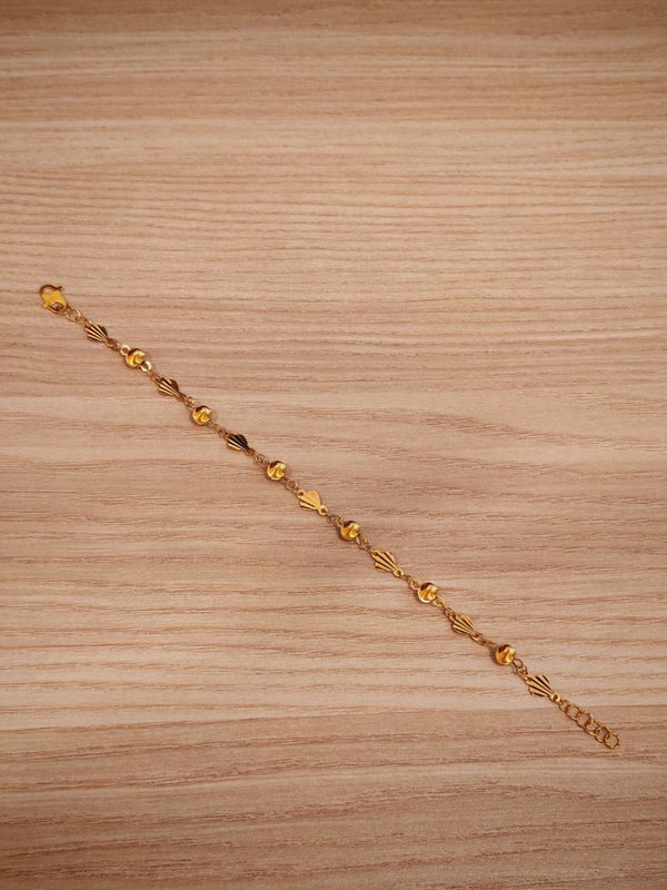 916 gold bracelet with shell and ball details