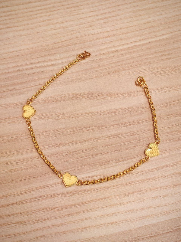 916 gold bracelet with sunflower and heart details