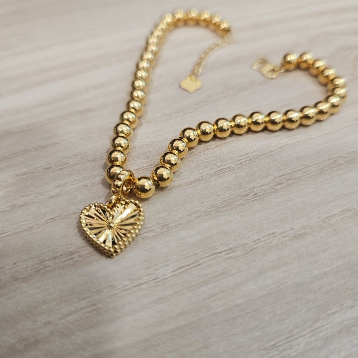 916 Gold Bead Bracelet with Dangling Cutting Heart DesignBraceletsBest Gold Shop