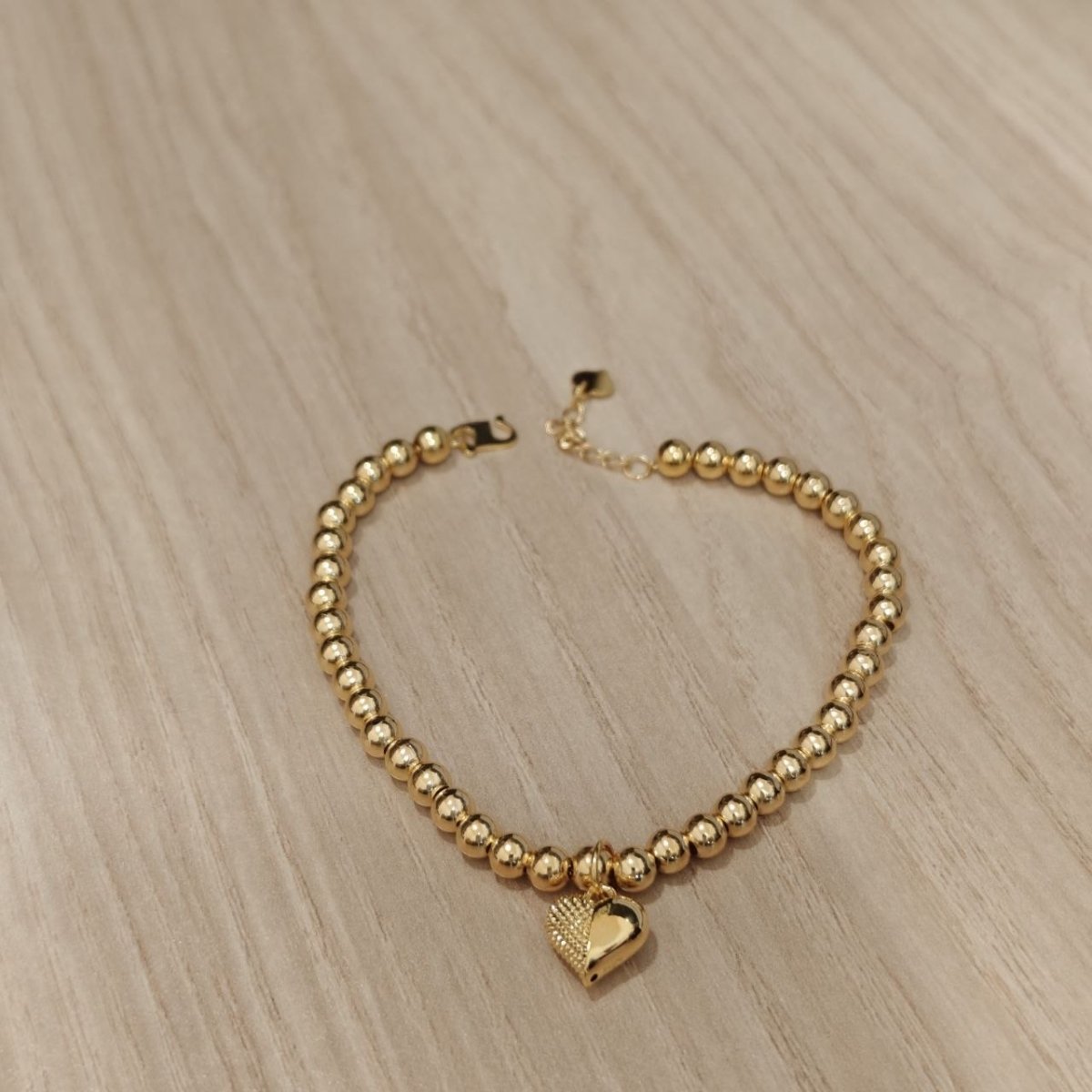 916 Gold Bead Bracelet With Dangling Diamond Cut Heart V2 Feather LightBraceletsBest Gold Shop