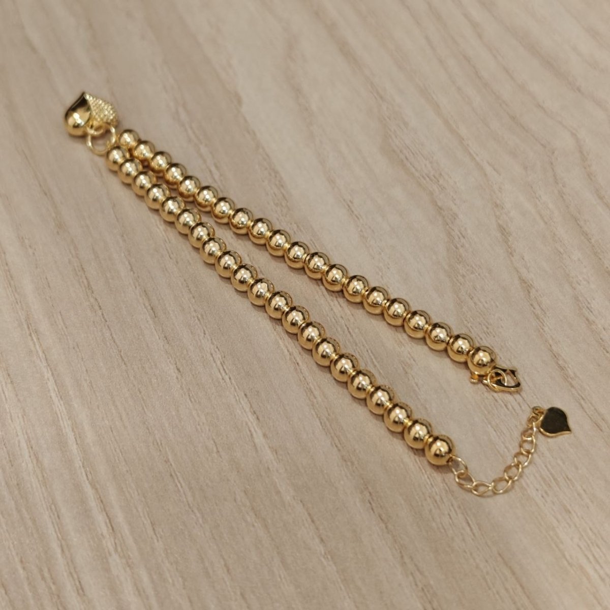 916 Gold Bead Bracelet With Dangling Diamond Cut Heart V2 Feather LightBraceletsBest Gold Shop