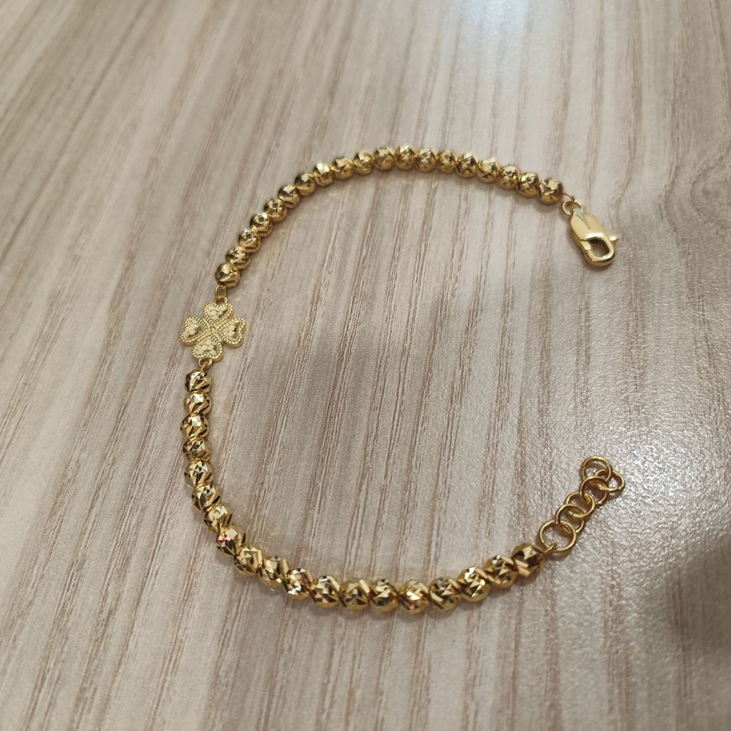 916 gold flower bead bracelet with clover centerpiece