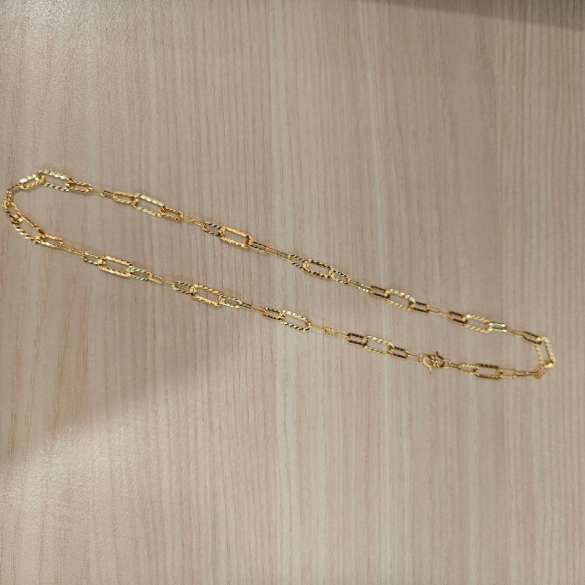 Side view of 916 Gold Diamond-Cut Fancy Link chain necklace.