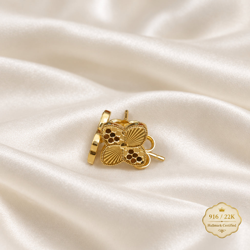 Back view of a petal earring on light fabric
