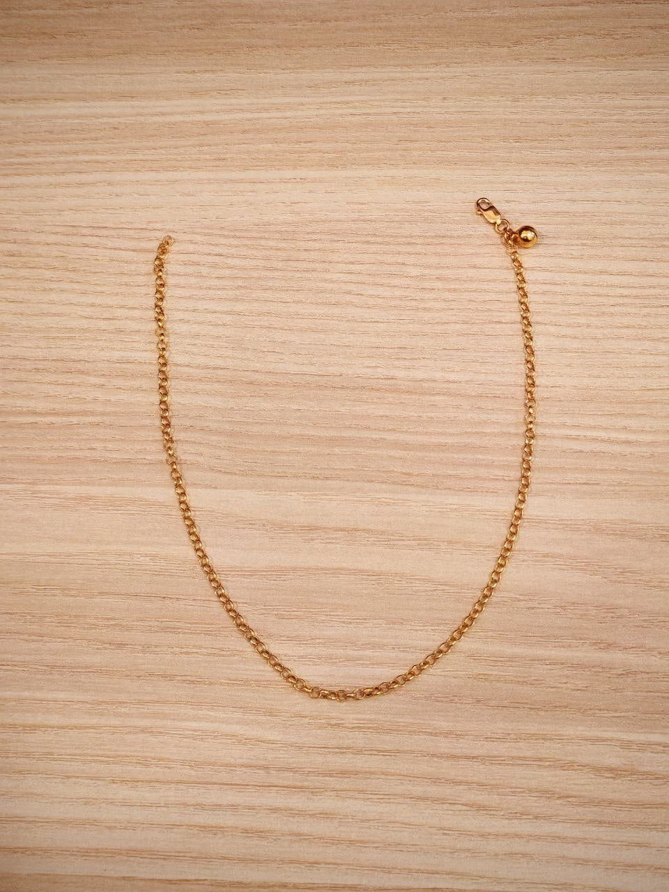916 Gold round link bell anklet front view