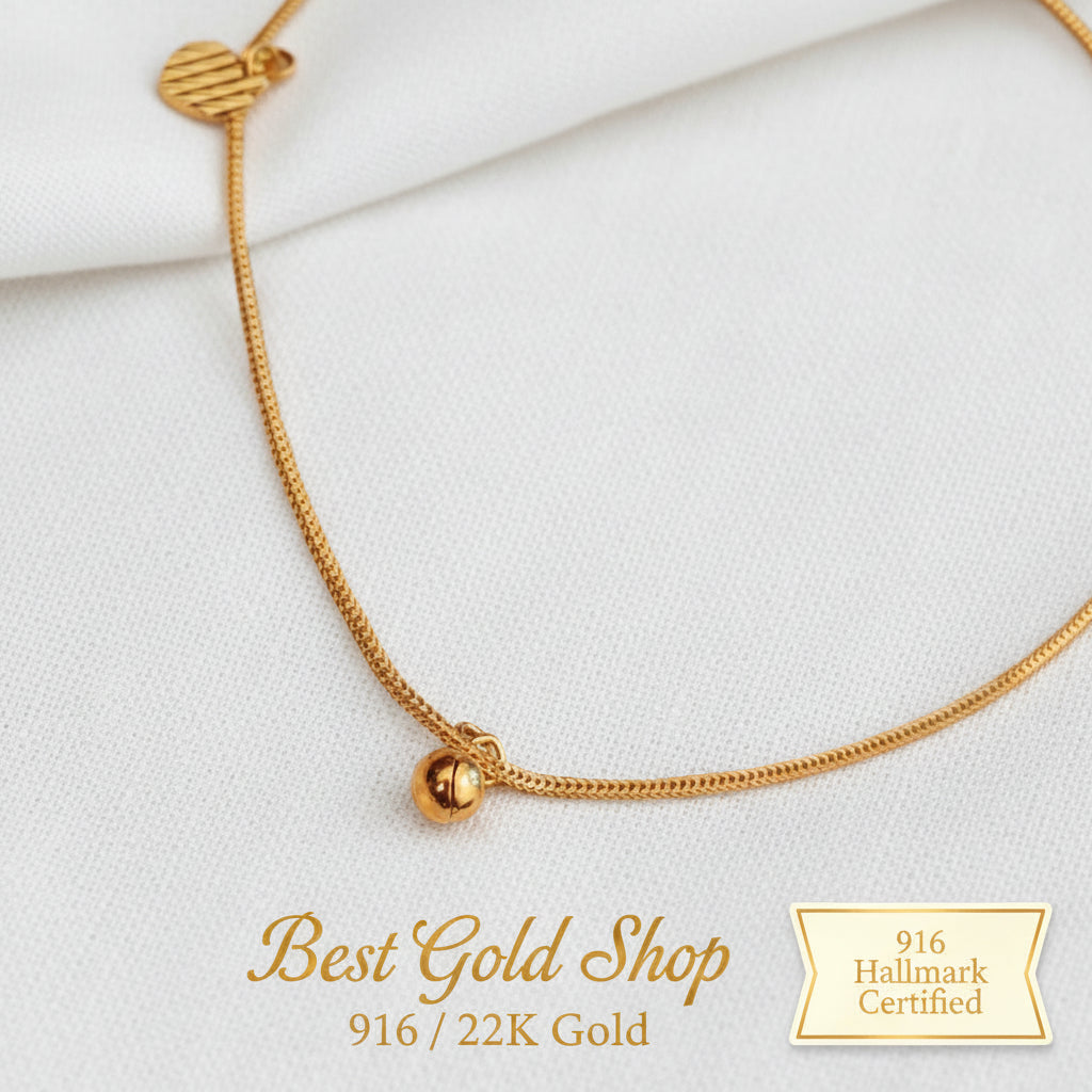 916 gold anklet with striped heart charms and a bell