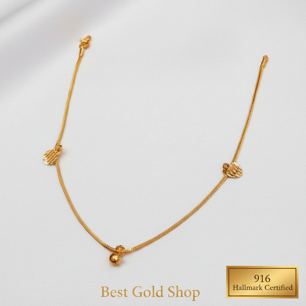 916 gold anklet with striped heart charms and a bell