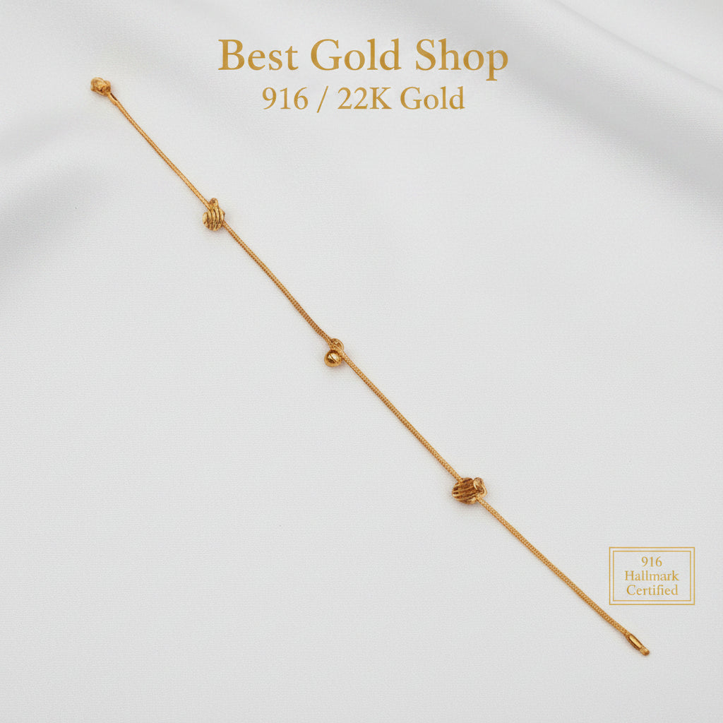 916 gold anklet with striped heart charms and a bell