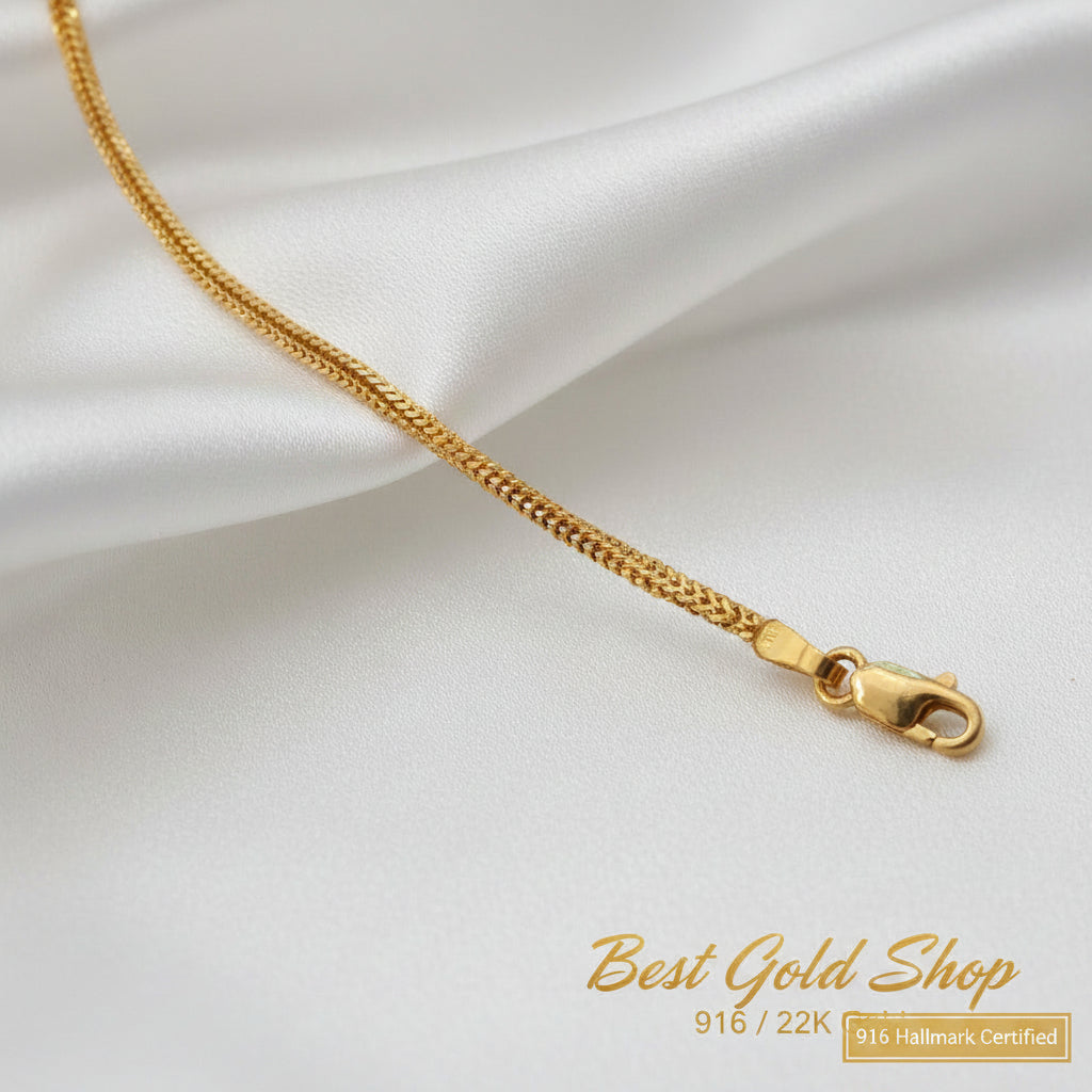 916 gold anklet with textured heart charms and a bell