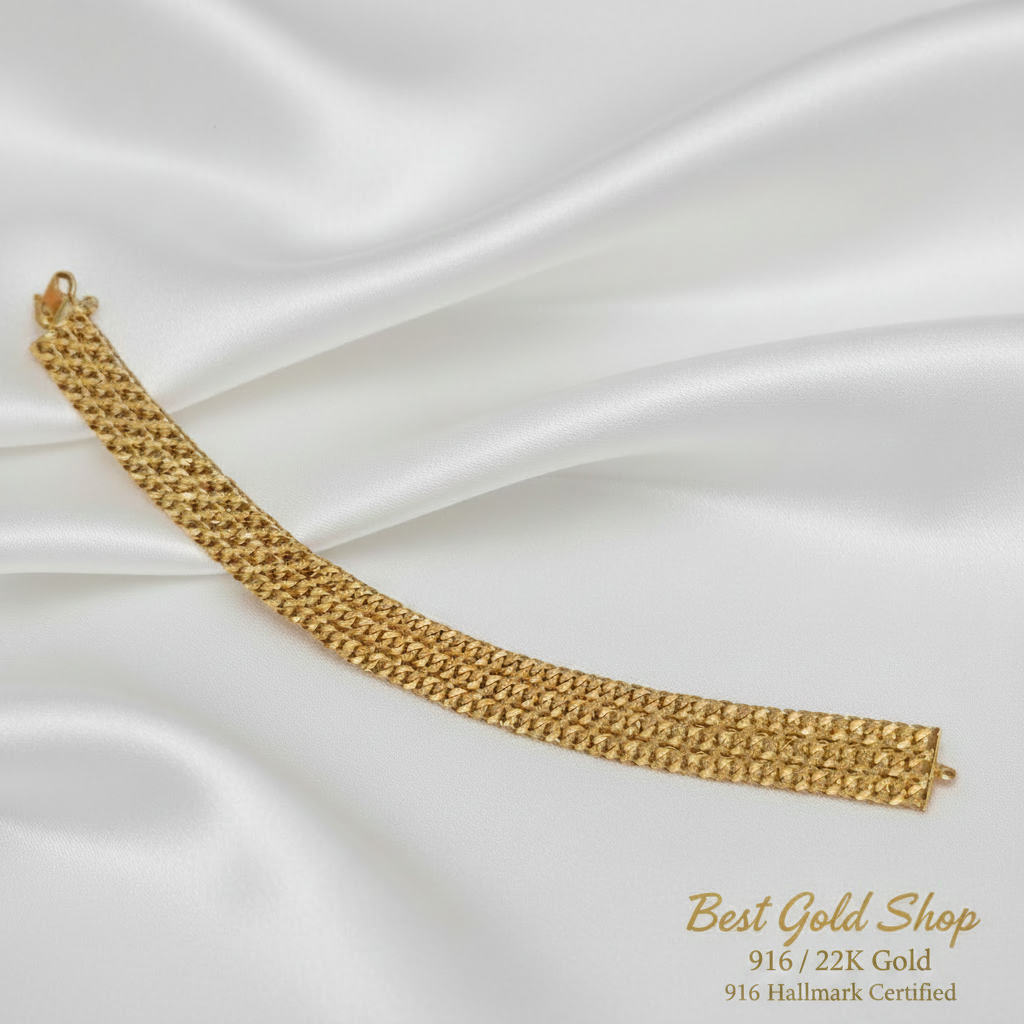 916 Gold (22K) Triplet Cowboy Chain Bracelet on white satin.