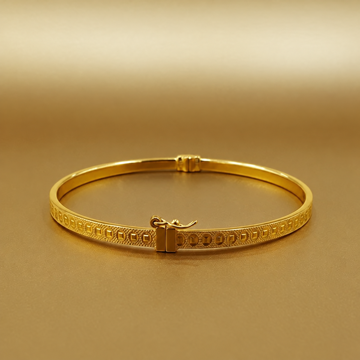 916 gold vintage coin bangle with engraved pattern on warm gold background