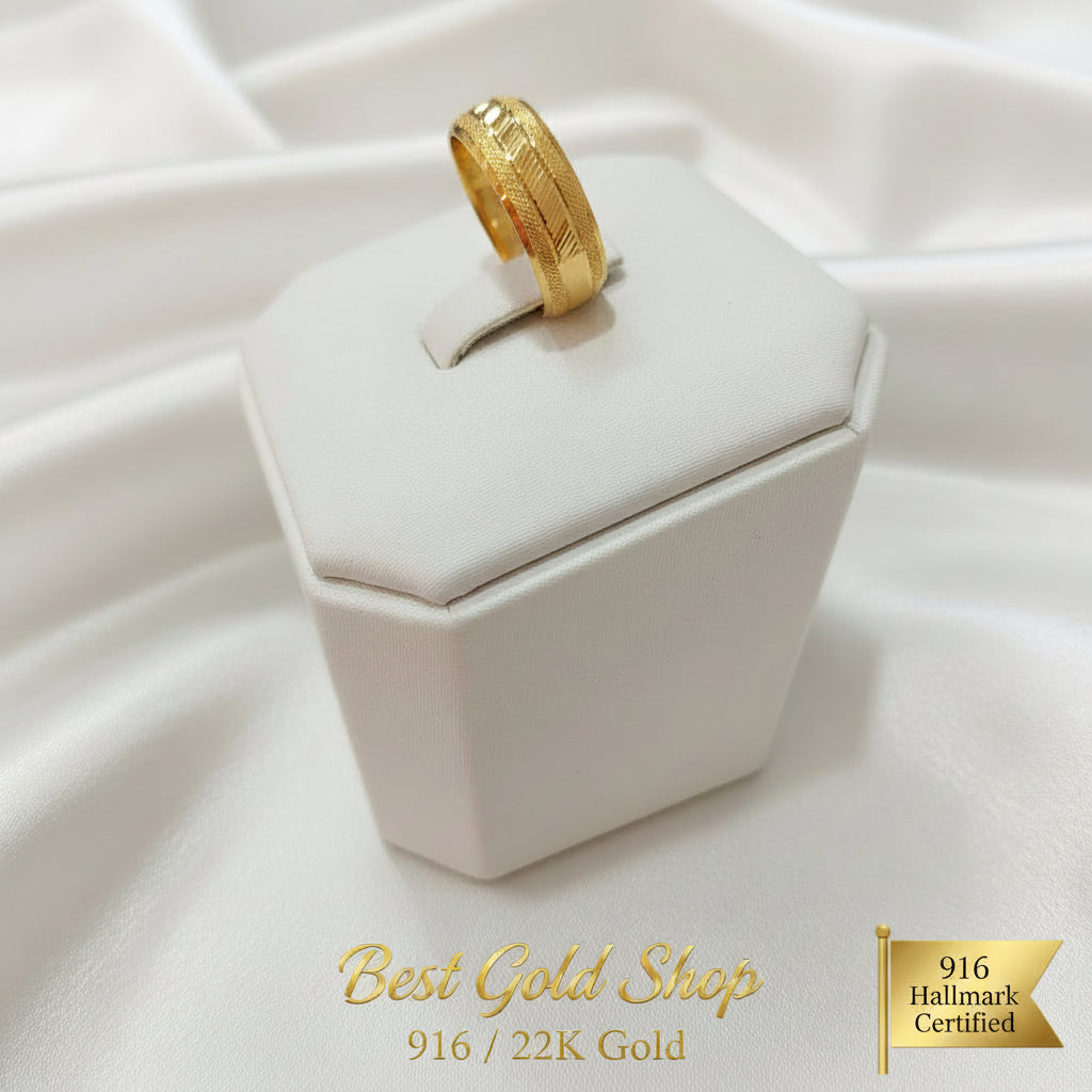 Angled view of the polished 916 gold wide hollow ring Design 4