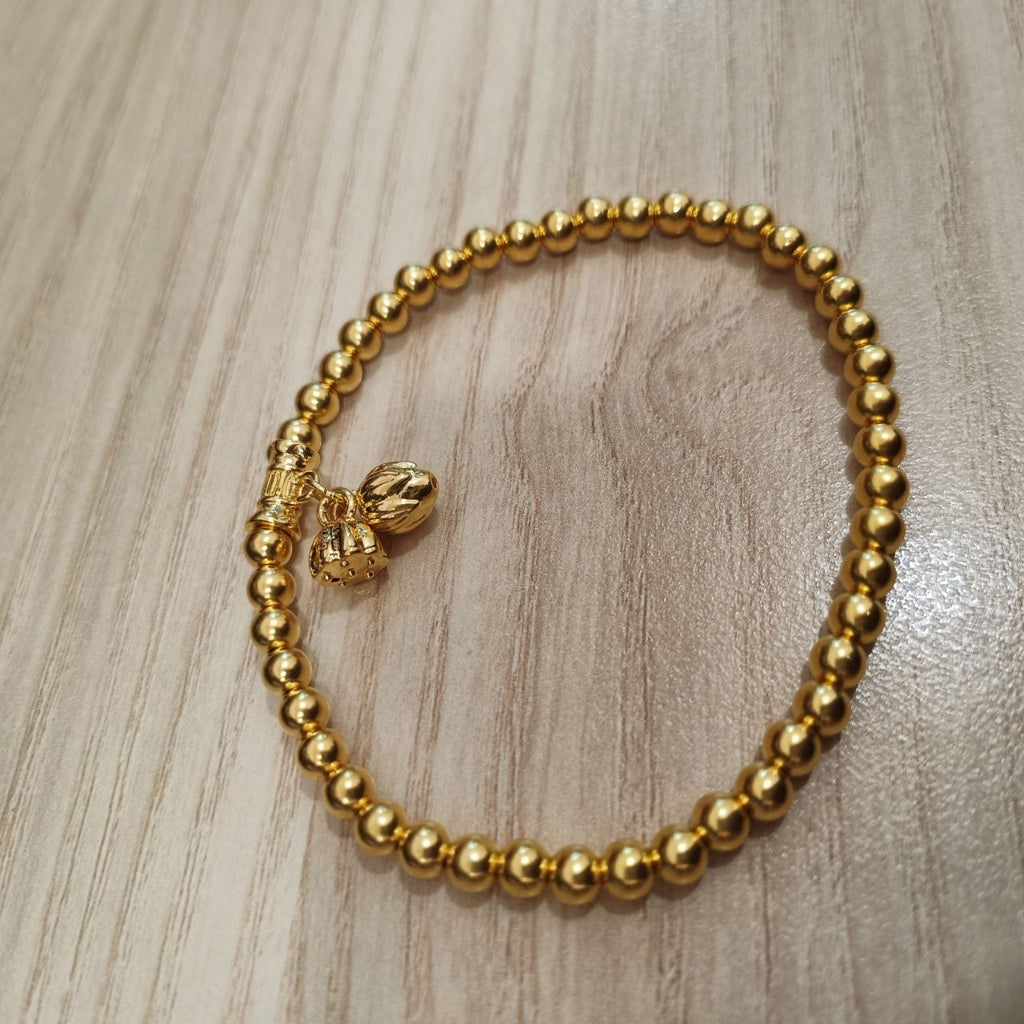 999 gold bead lotus bracelet with polished round beads - alternate view