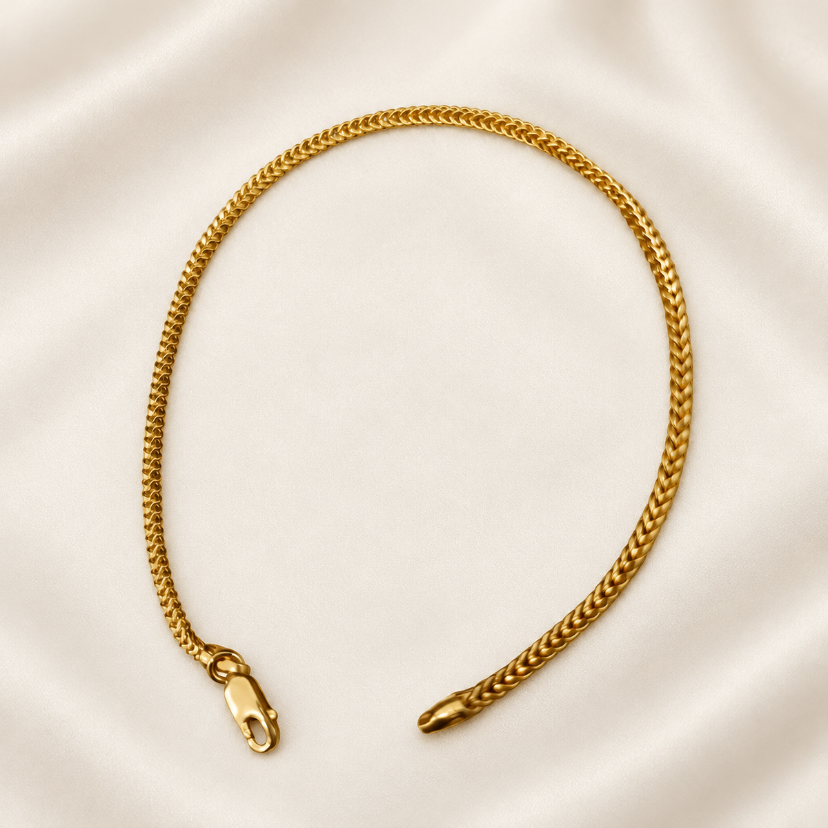 22K / 916 gold Hollow Box Bracelet, full view showing slim linked chain and lobster clasp on ivory