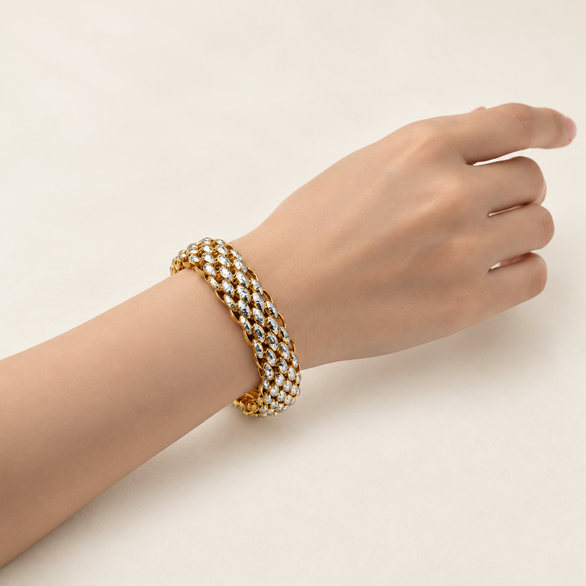 22K / 916 gold Fancy Bracelet worn on the wrist, showing its wide faceted profile