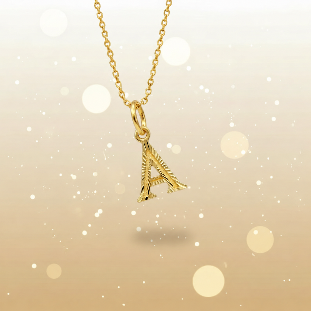 Guild Bullion 916 gold letter A pendant on a chain for styling reference; chain not included