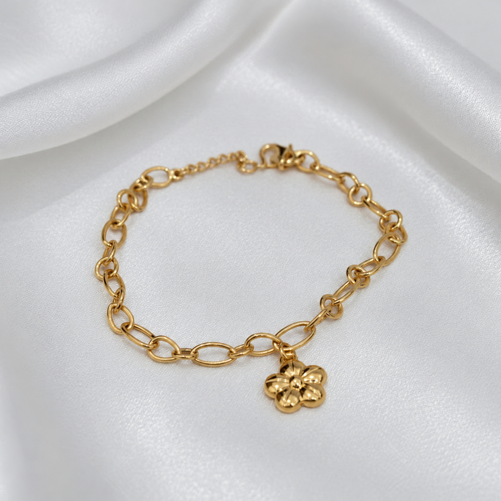 Oval arrangement of the 916 gold five-petal flower charm bracelet showing polished links and adjustable fastening