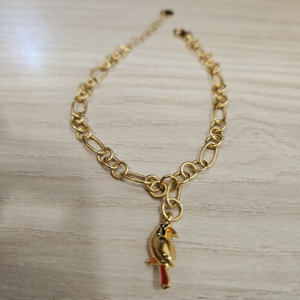 Front view of the 916 gold red-bird charm link bracelet with adjustable extension chain