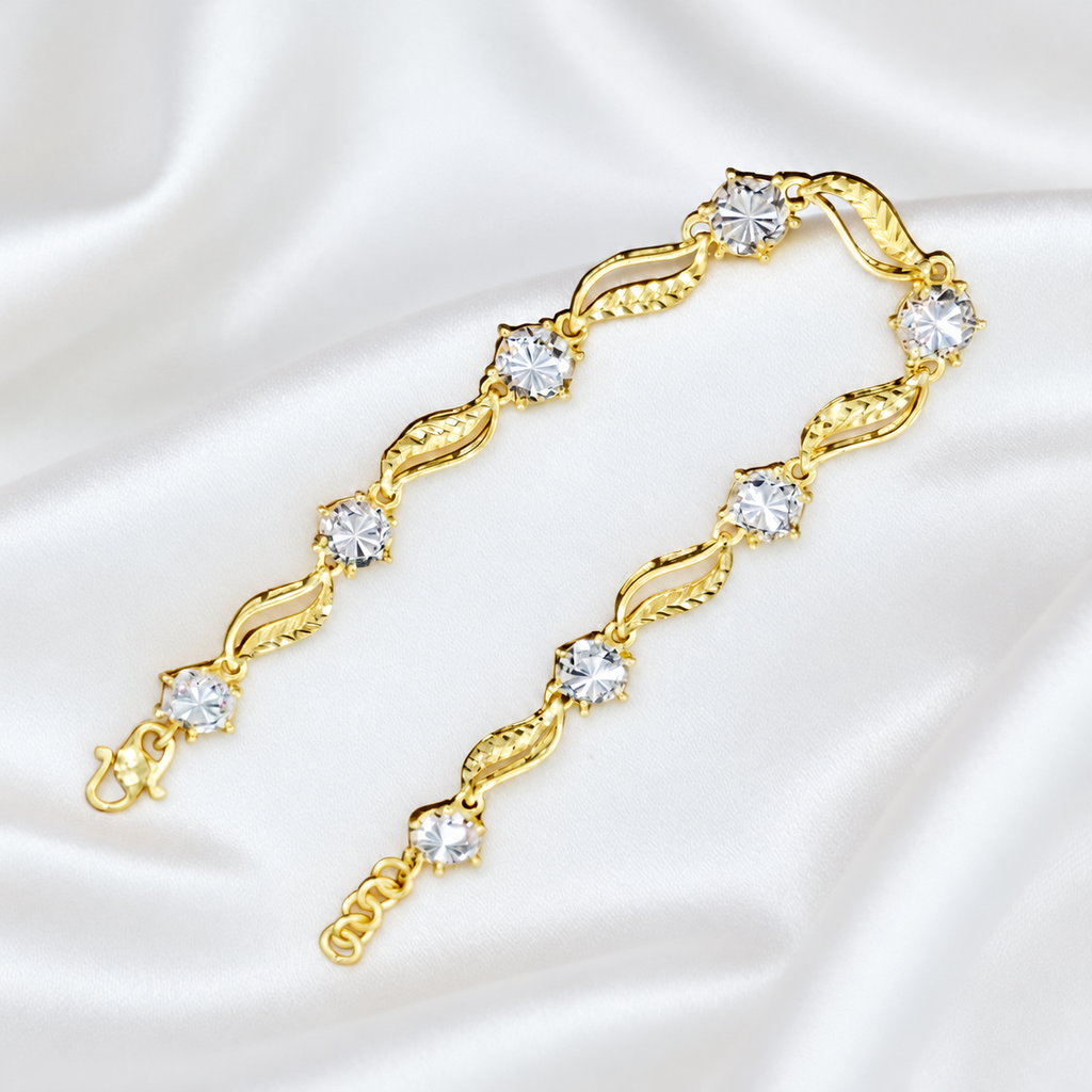 Reference leaf-link bracelet with round silver-coloured accents and hook clasp on white satin