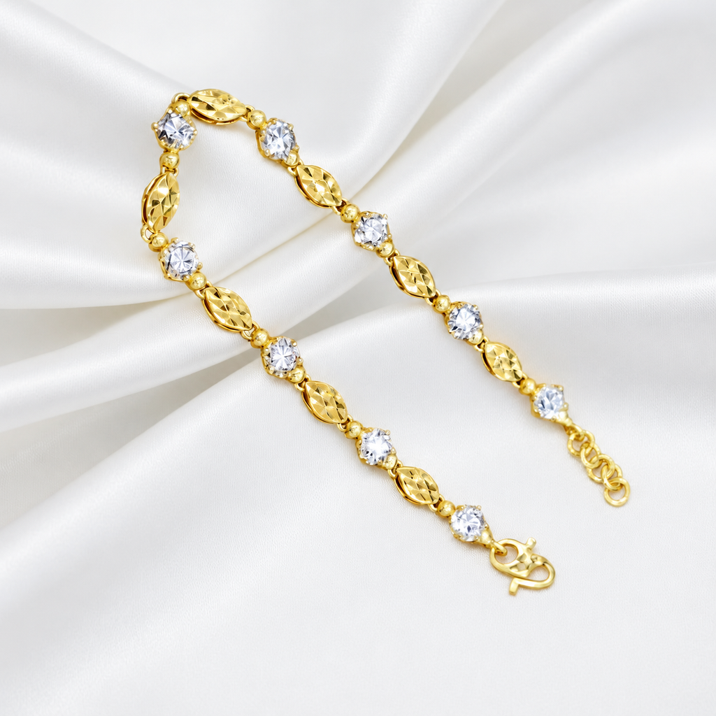 Guild Bullion BR7036 916 gold faceted oval-link bracelet extended on satin with hook clasp and adjustment rings