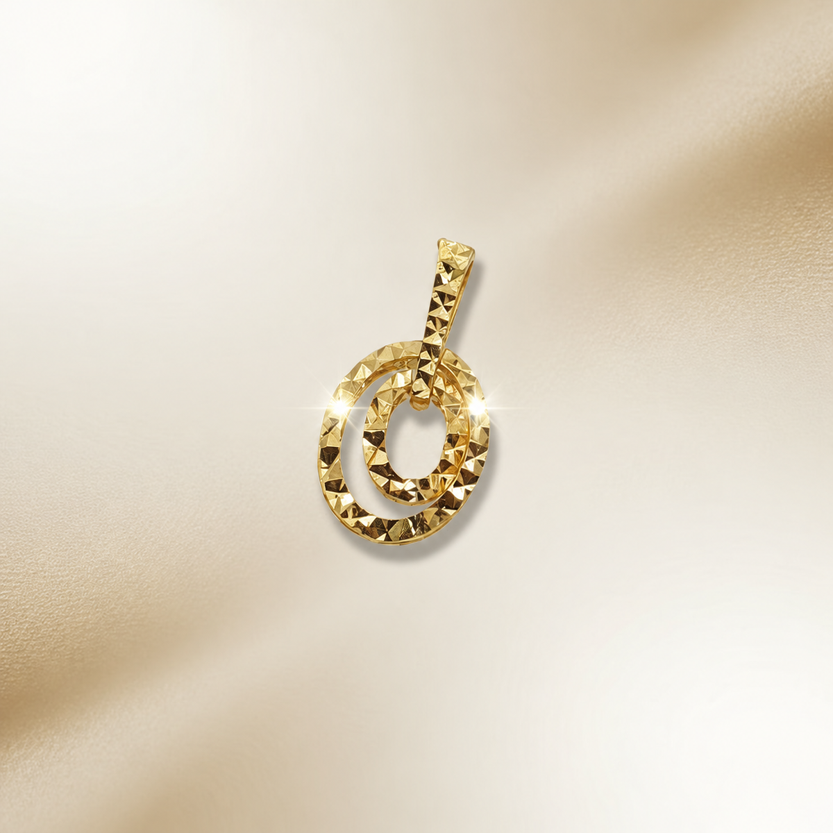 916 gold double-oval pendant showing nested faceted loops and bail