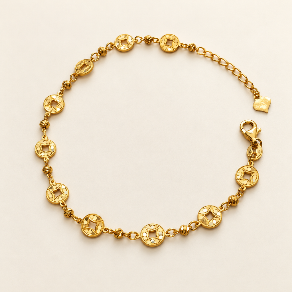 Extended arrangement of the 22K gold Geometric Round Bracelet showing openwork circles, textured beads and adjustable fastening