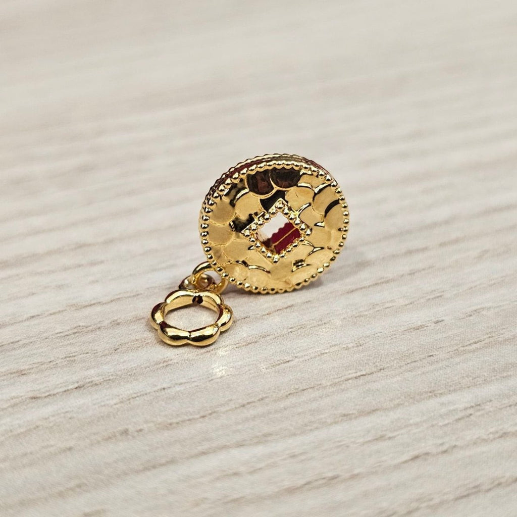 Guild Bullion 916 gold cutout disc with coloured accents; collection design reference. Check selector for current options and availability.