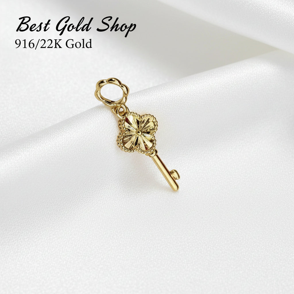 Guild Bullion 916 gold flower key charm; collection design reference. Check selector for current options and availability.