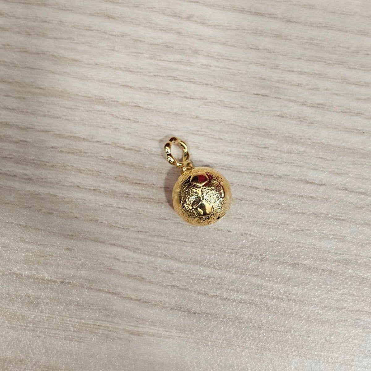 Guild Bullion 916 gold ball pendant; collection design reference. Check selector for current options and availability.
