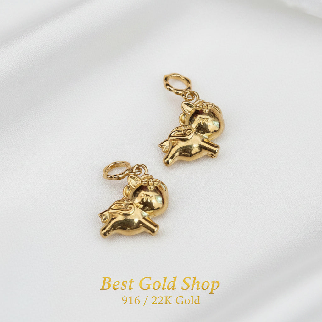 Guild Bullion 916 gold paired animal figures; collection design reference. Check selector for current options and availability.