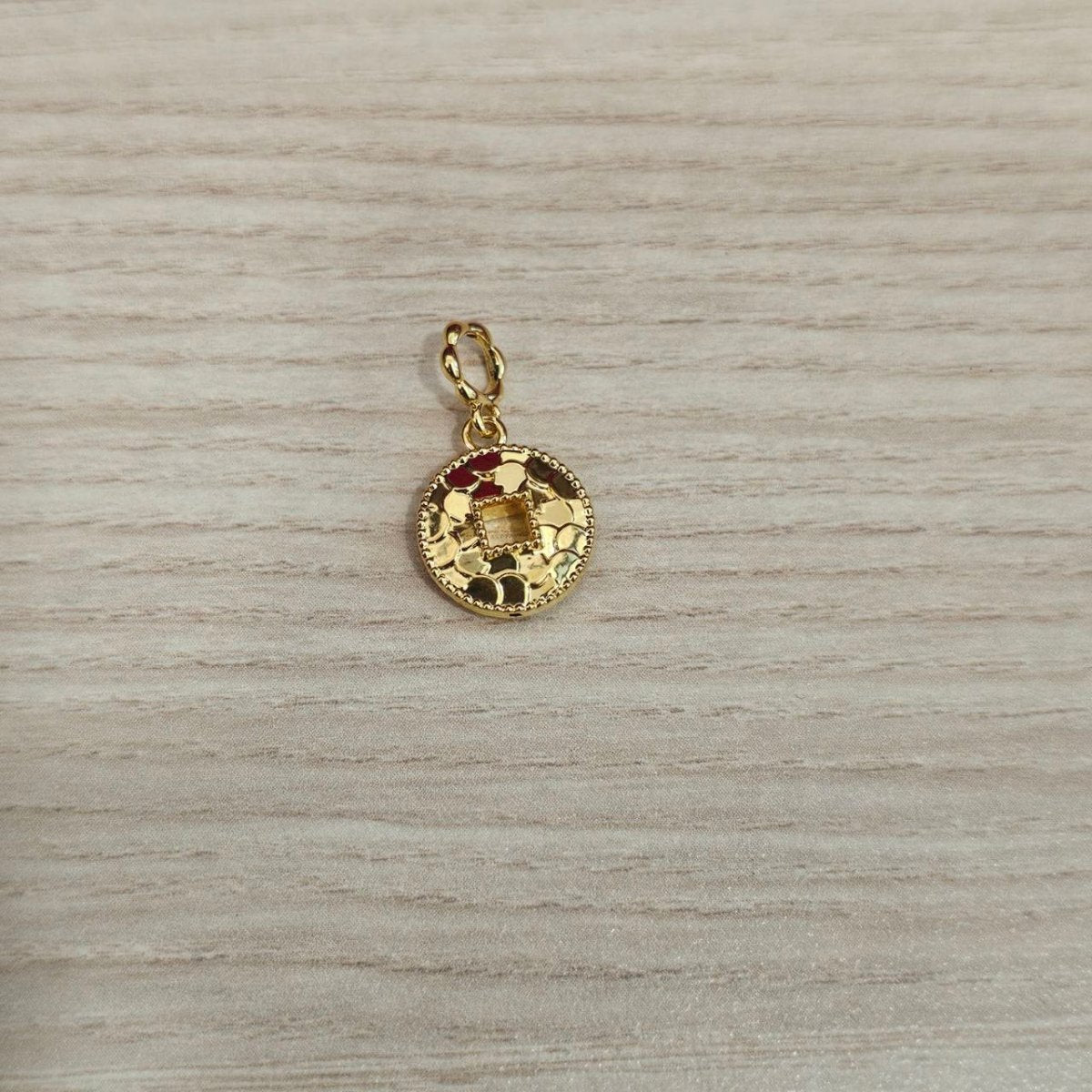 Guild Bullion 916 gold faceted ball charm; collection design reference. Check selector for current options and availability.