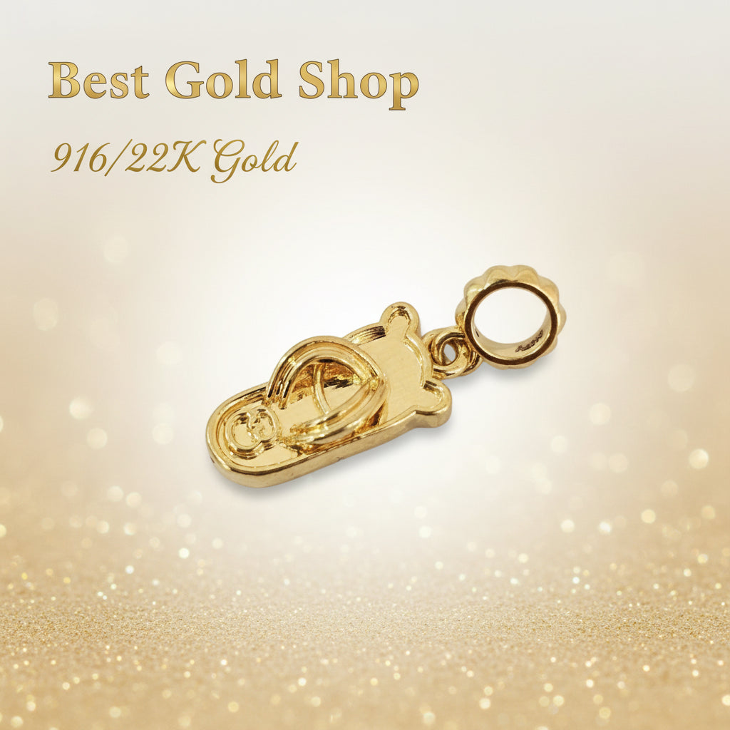 Guild Bullion 916 gold shoe charm; collection design reference. Check selector for current options and availability.