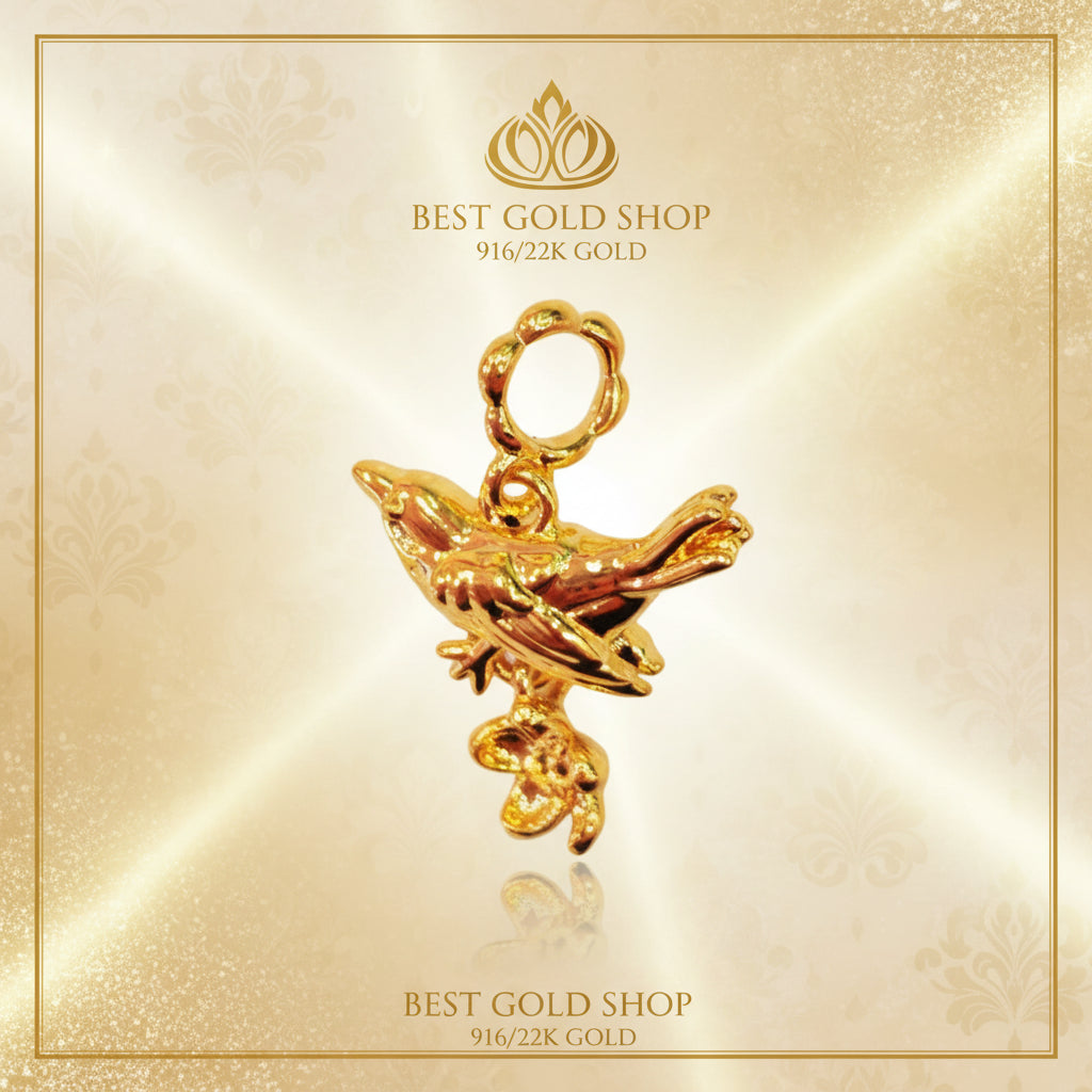 Guild Bullion 916 gold bird and coin charm; collection design reference. Check selector for current options and availability.