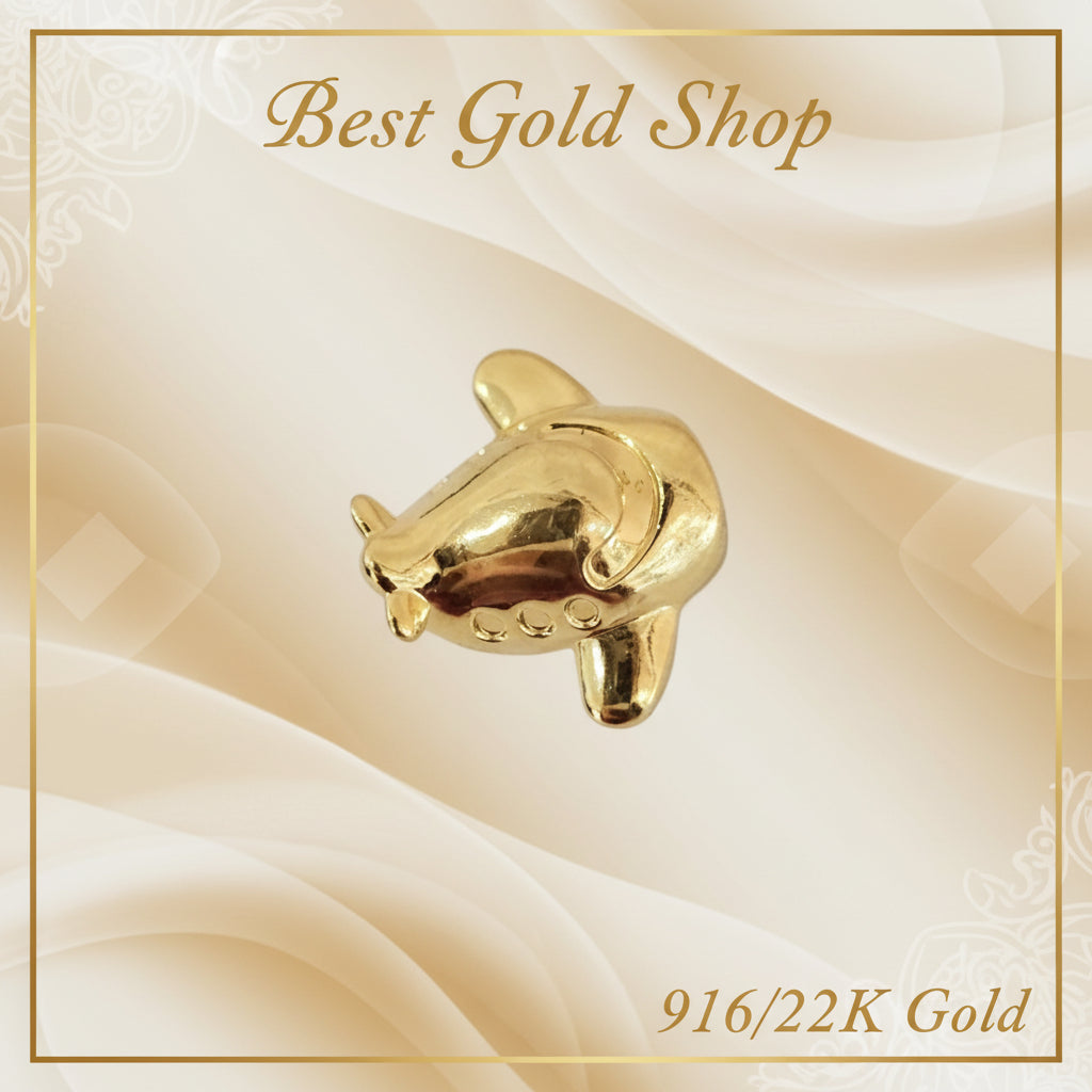 Guild Bullion 916 gold airplane charm; collection design reference. Check selector for current options and availability.