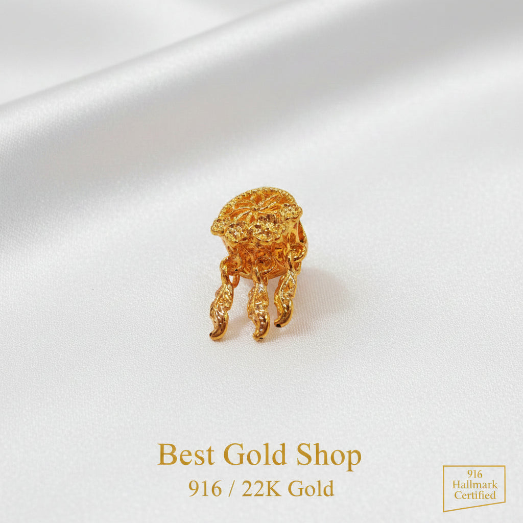 Guild Bullion 916 gold dreamcatcher charm; collection design reference. Check selector for current options and availability.
