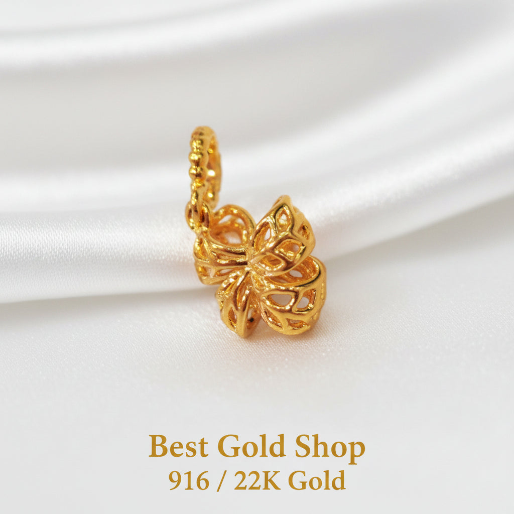 Guild Bullion 916 gold cutout leaf charm; collection design reference. Check selector for current options and availability.