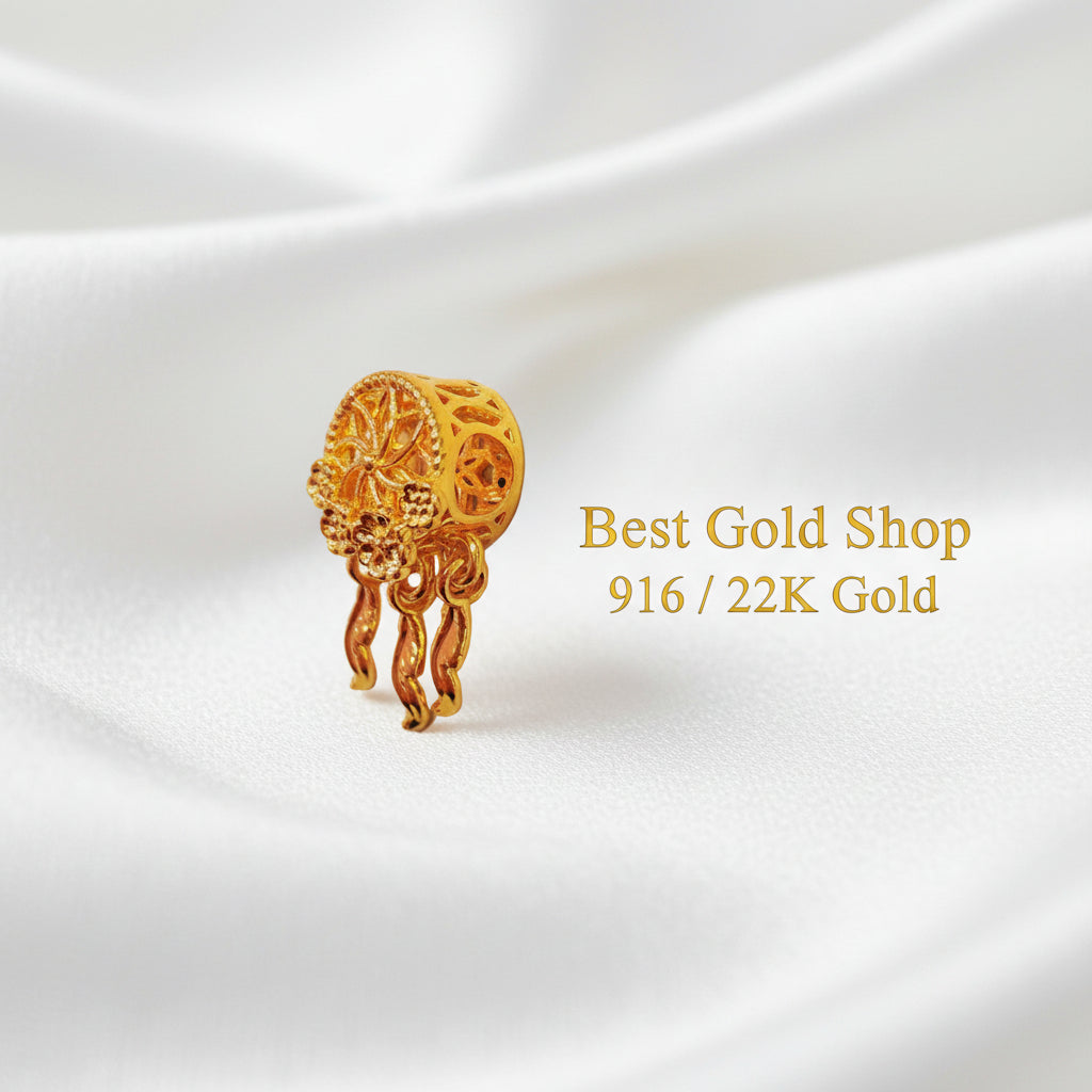 Guild Bullion 916 gold dreamcatcher charm; collection design reference. Check selector for current options and availability.