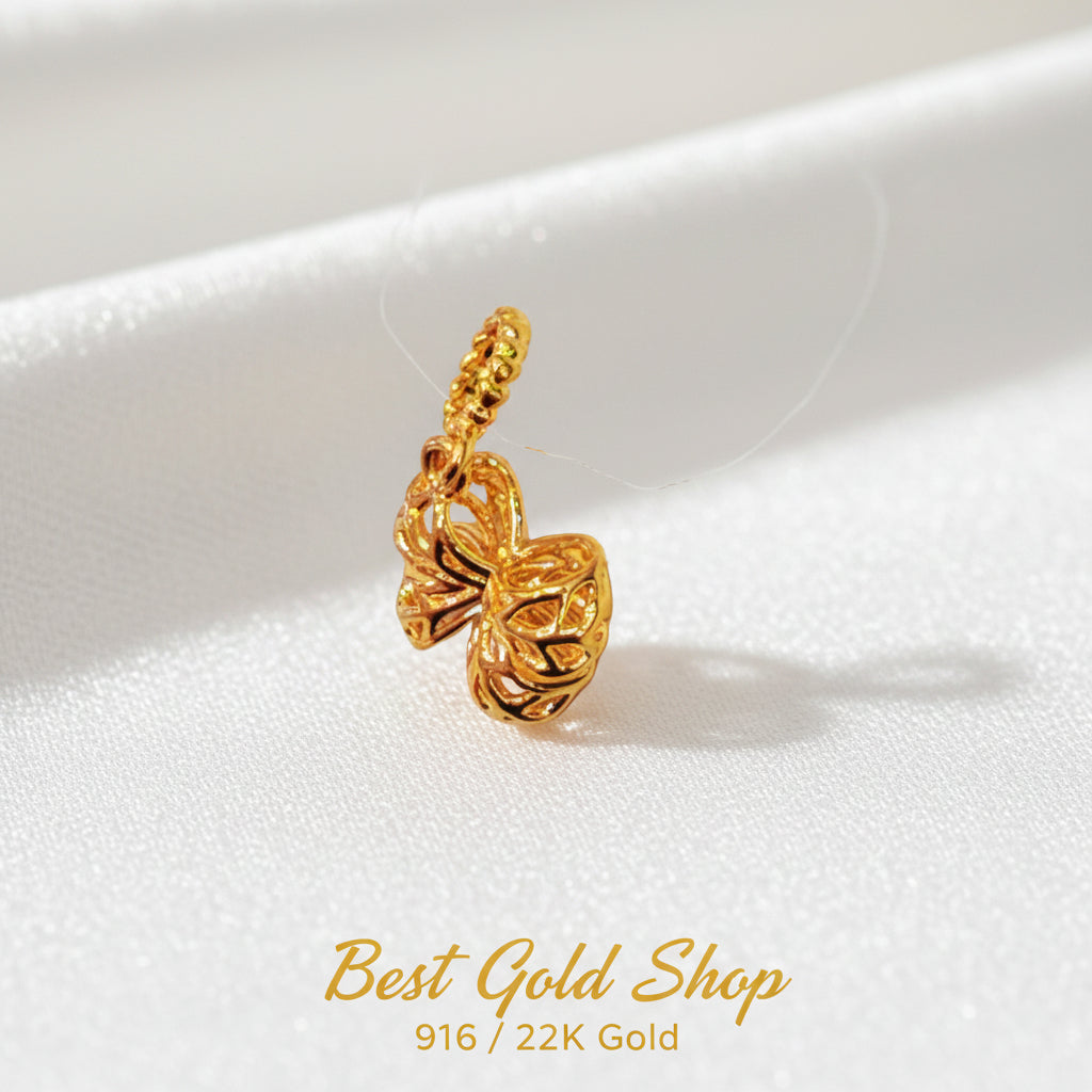 Guild Bullion 916 gold paired leaf charm; collection design reference. Check selector for current options and availability.
