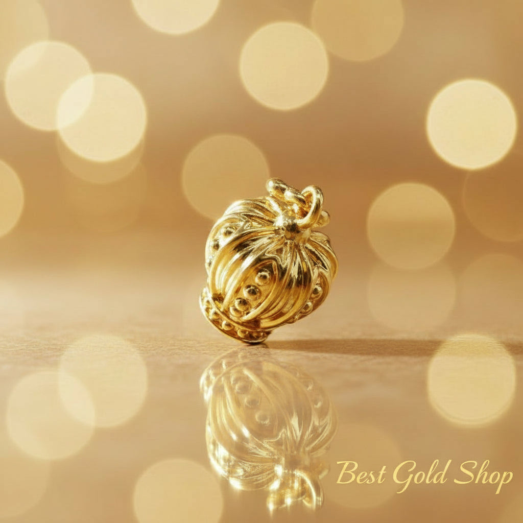 Guild Bullion 916 gold openwork sphere charm; collection design reference. Check selector for current options and availability.