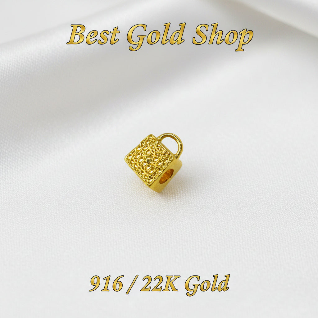 Guild Bullion 916 gold textured handbag charm; collection design reference. Check selector for current options and availability.