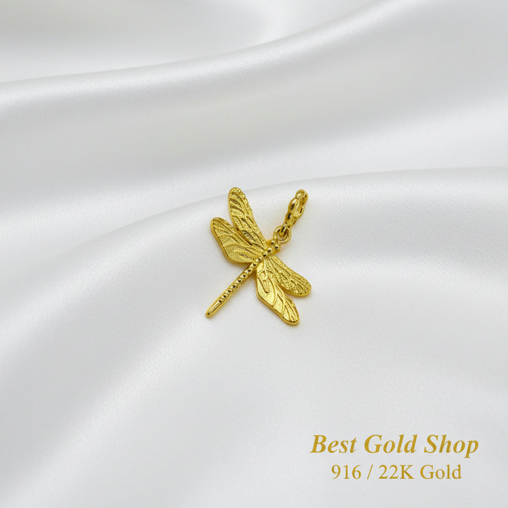 Guild Bullion 916 gold dragonfly charm; collection design reference. Check selector for current options and availability.