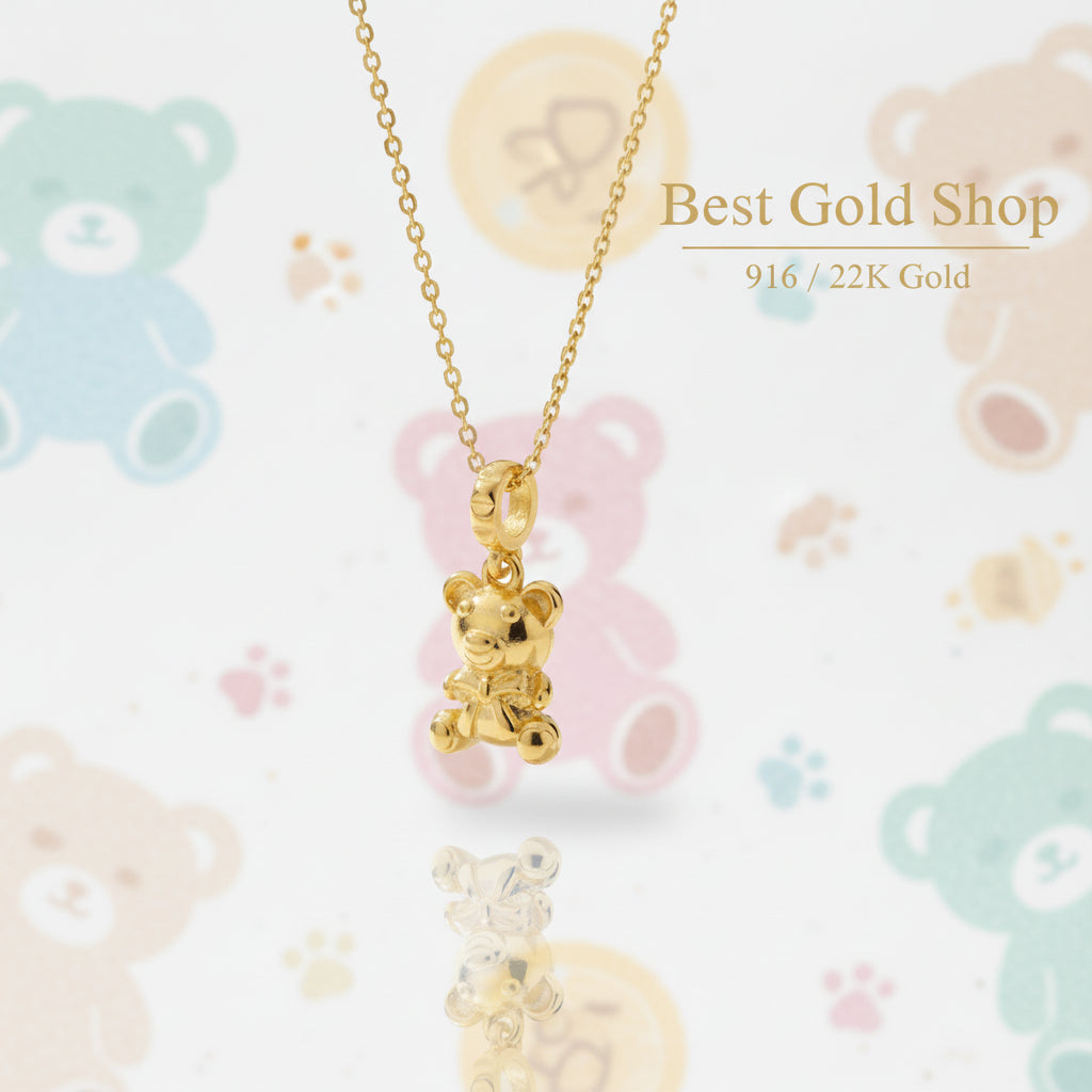 Guild Bullion 916 gold teddy bear displayed on chain; collection design reference. Check selector for current options and availability.