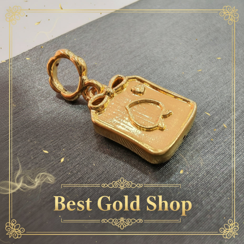 Guild Bullion 916 gold rectangular animal motif charm; collection design reference. Check selector for current options and availability.