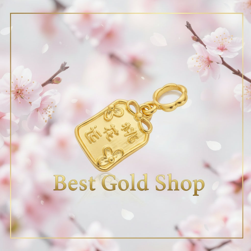 Guild Bullion 916 gold character plaque charm; collection design reference. Check selector for current options and availability.