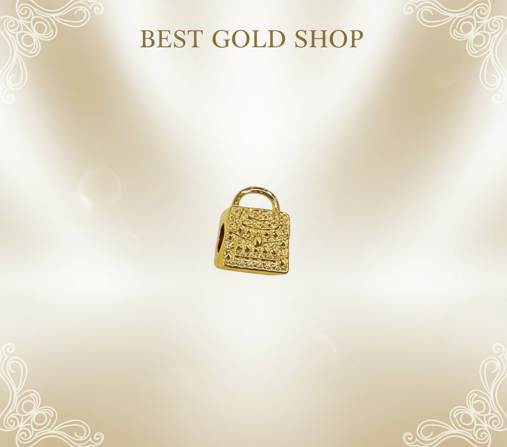 Guild Bullion 916 gold textured handbag charm; collection design reference. Check selector for current options and availability.