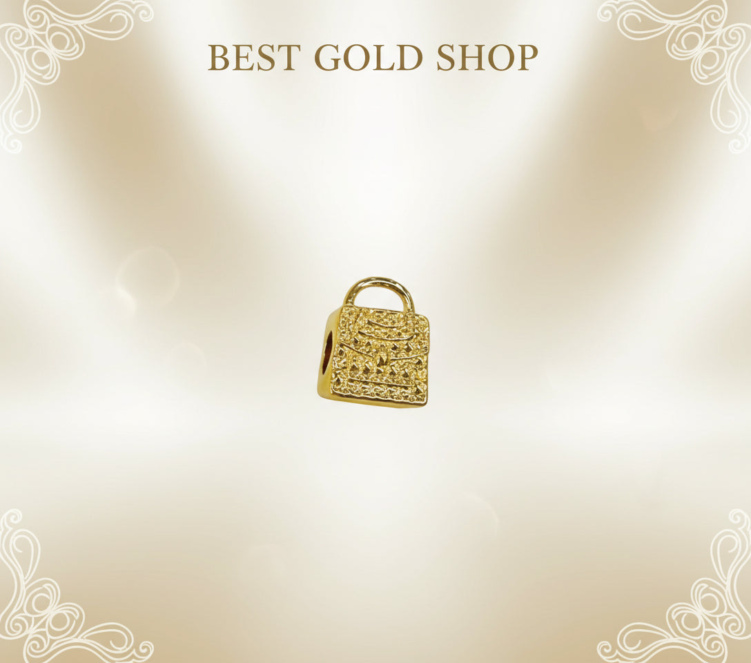 Guild Bullion 916 gold textured handbag charm; collection design reference. Check selector for current options and availability.