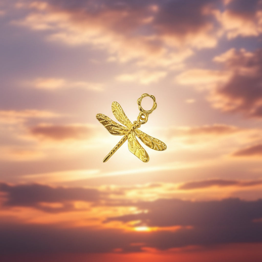 Guild Bullion 916 gold dragonfly charm; collection design reference. Check selector for current options and availability.