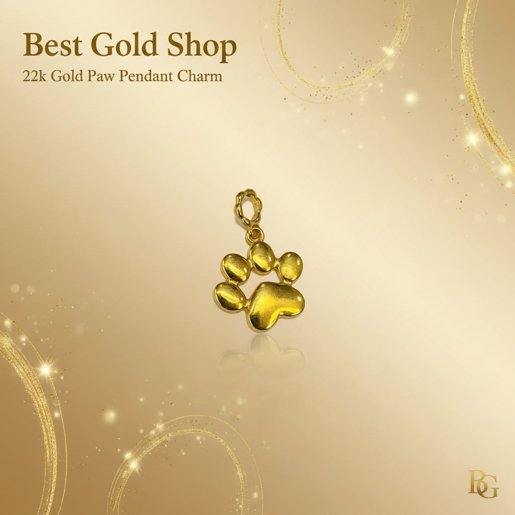 Guild Bullion 916 gold paw print charm; collection design reference. Check selector for current options and availability.