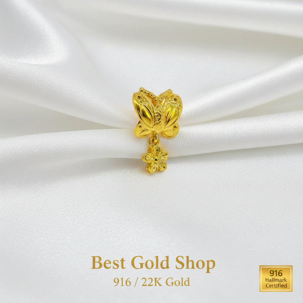 Guild Bullion 916 gold floral bead with dangle; collection design reference. Check selector for current options and availability.