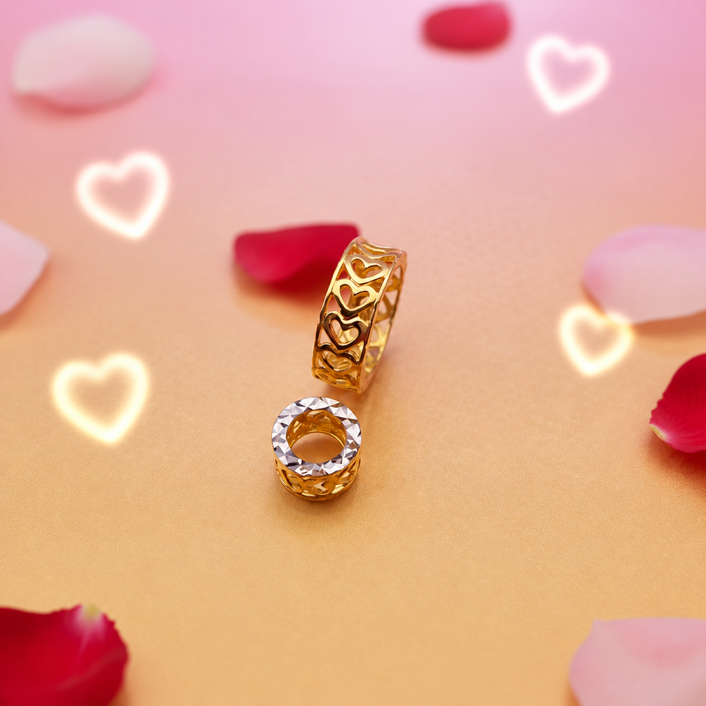 Openwork heart-motif ring forms and two-tone faceted detail on a pink and gold background